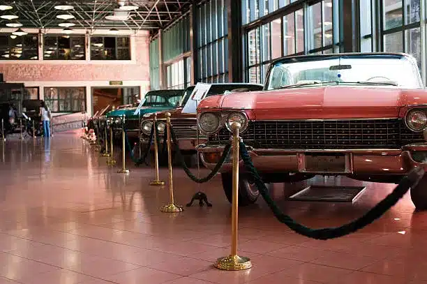 High horsepower vintage cars in a showroom